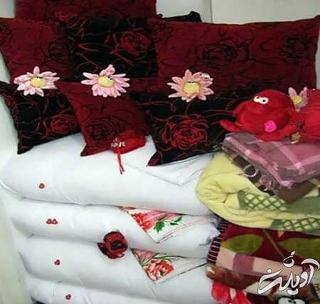 روش های چیدن رختخواب های عروس,تزیین رختخواب عروس,نحوه ی چیدمان پتو برای عروس